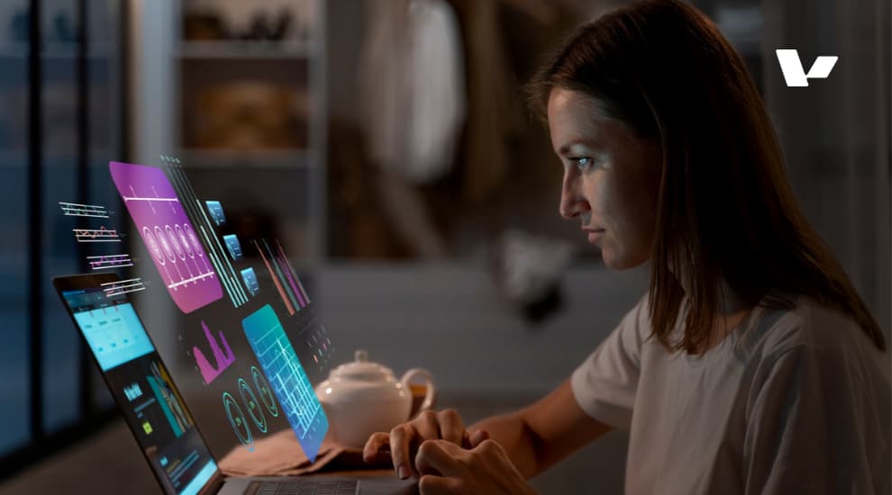  A woman working on a laptop, surrounded by floating data visualizations and digital graphs, symbolizing the use of AI and data analysis in modern learning and technology.